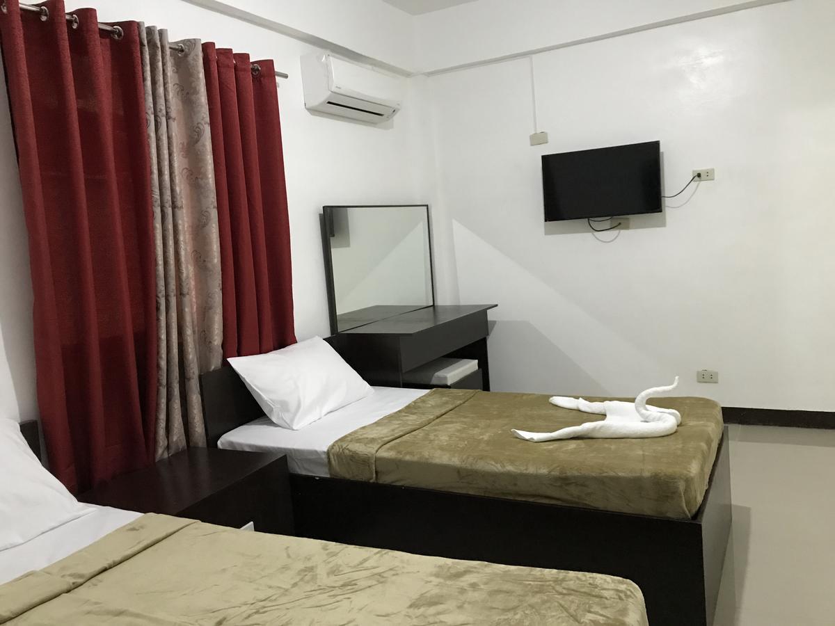 4C'S Tourist Lodge Puerto Princesa Екстер'єр фото