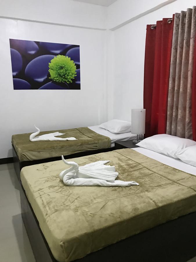 4C'S Tourist Lodge Puerto Princesa Екстер'єр фото